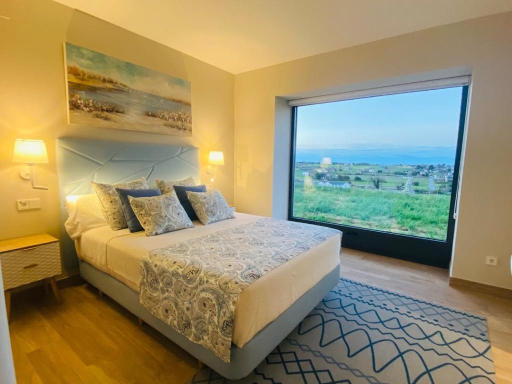 Ferienwohnung El Pueblin Del Pinar Navia Exterior foto